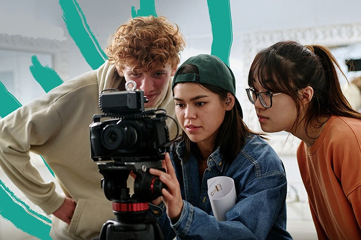 Teens operating a camera